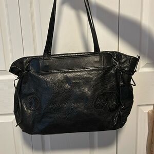 Carlos Falchi bag. Black leather. Shoulder bag. Ships in duster bag.